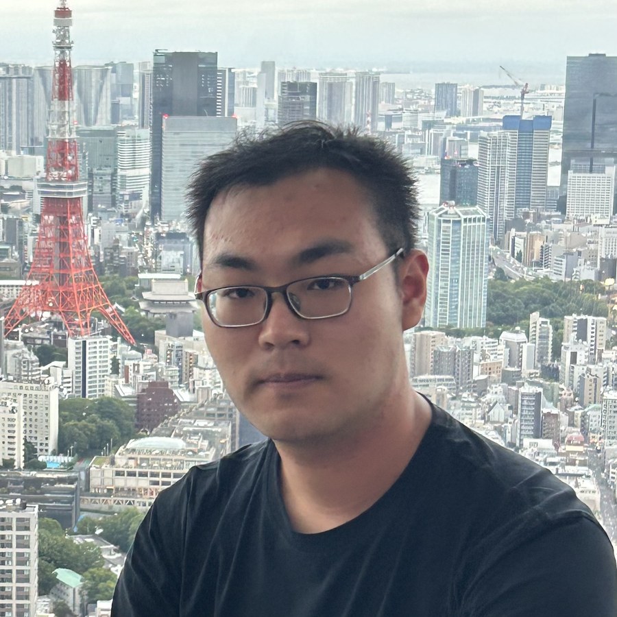 Ziyang Lin, with the Tokyo skyline in the background